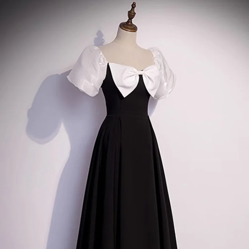 Black Gown With White Bow And Sleeves on Luulla