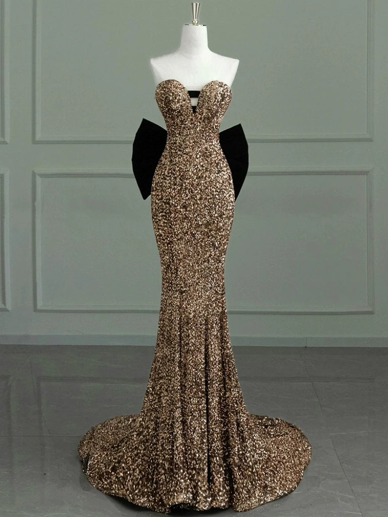 Sequin Mermaid Gown With Black Bow Accents
