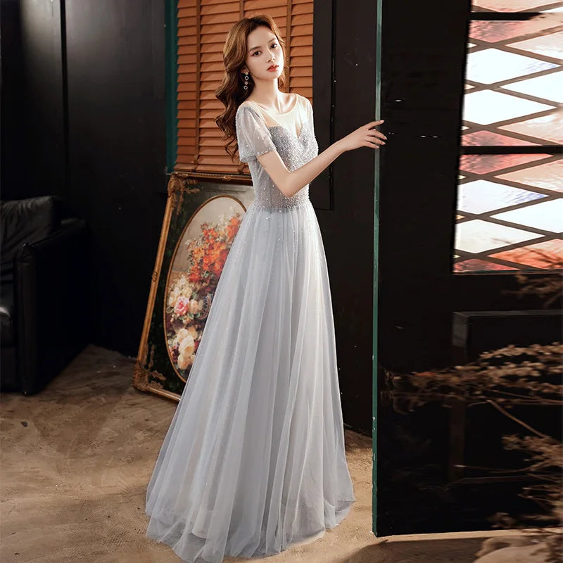 silver tulle dress Shimmering Silver Tulle Gown  Monique Lhuillier