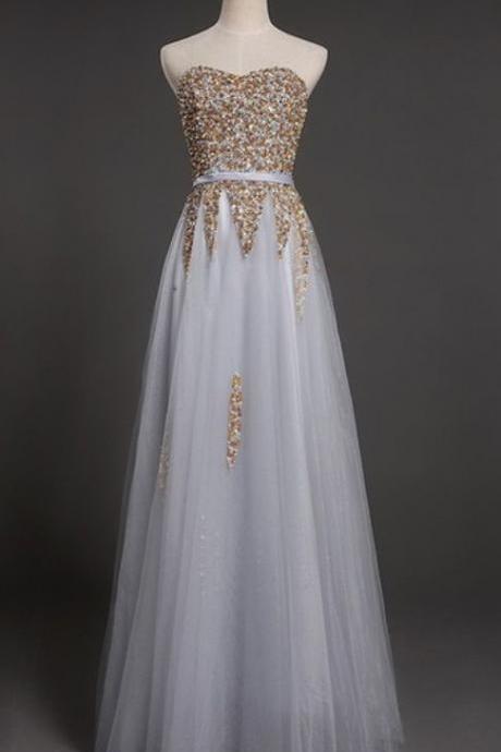 Evening Gown Of A Lavish Crystal Evening Gown With A Long Skirt And A Formal Dress