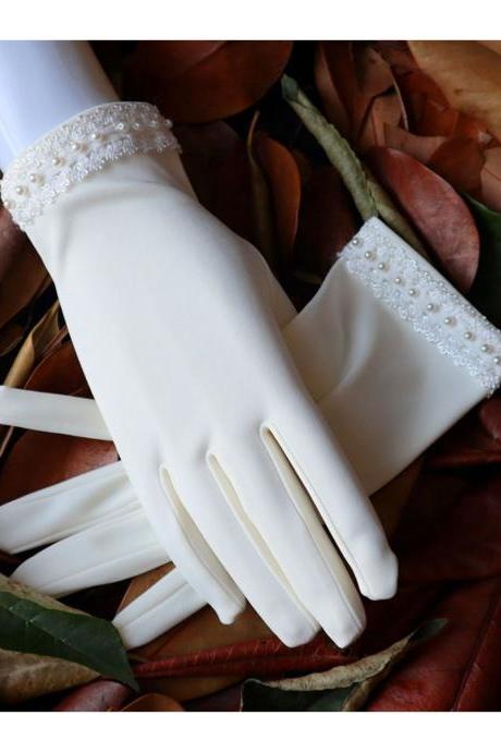 Satin beaded short wedding gloves, bridal wedding accessories, studio photo with makeup modeling, performance accessories
