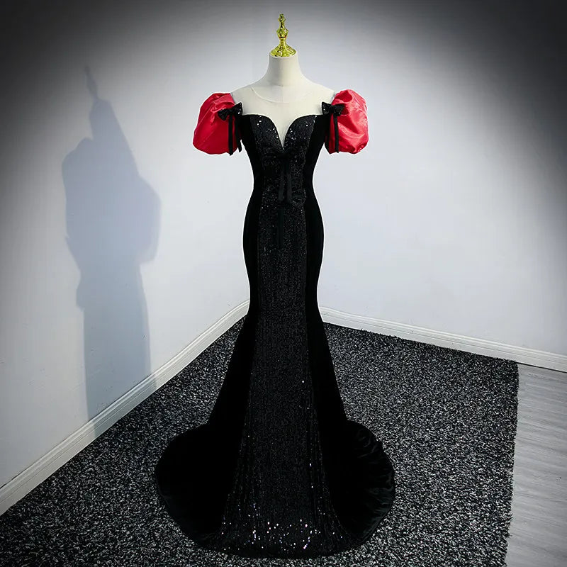 Chic Black Gown With Dramatic Red Sleeves on Luulla