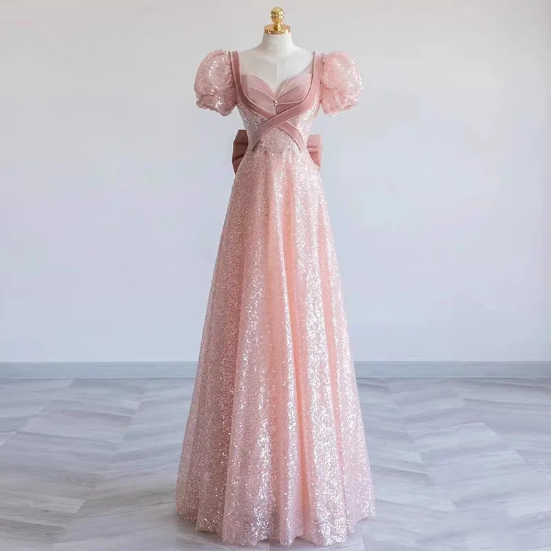 Sparkling Pink Puff Sleeve Gown With Bow on Luulla